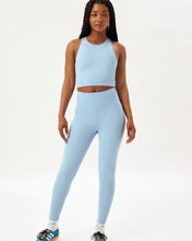 Load image into Gallery viewer, model wearing the Girlfriend Collective High-Rise Crop Legging in Cerulean
