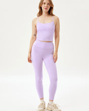 Load image into Gallery viewer, model standing wearing the Girlfriend Collective Ultralight Crop Legging in Bellflower
