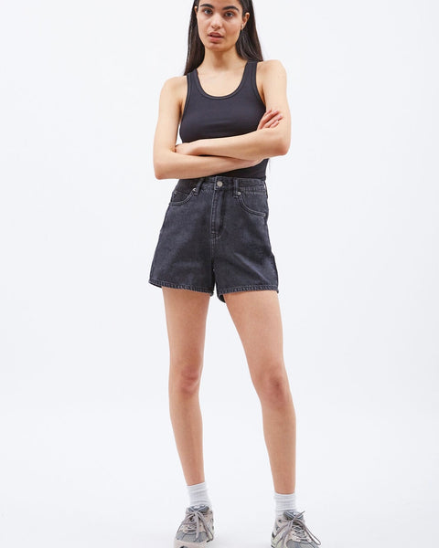Dr. Denim Women's Nora Shorts in Retro Black worn by a model standing