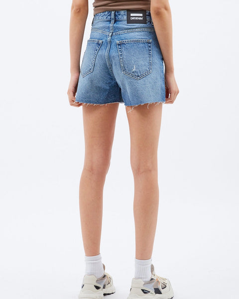 back view of the Dr. Denim Women's Nora Shorts in Drift Worn Blue on a model