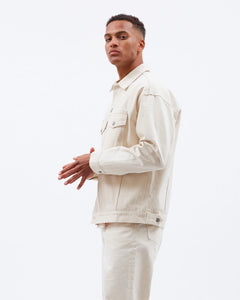 side view of the Dr. Denim Men's Eno Jacket in Ecru Denim on a model