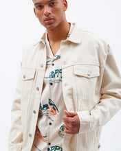 Load image into Gallery viewer, close up of a model wearing the Dr. Denim Men&#39;s Eno Jacket in Ecru Denim open over a printed shirt
