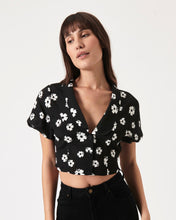 Load image into Gallery viewer, the Rolla&#39;s Folk Floral Susie Top in Black worn by a model posing looking to the side
