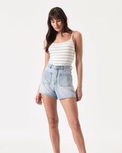 Load image into Gallery viewer, the model posing looking down wearing the Rolla&#39;s Women&#39;s Mirage Sailor Short in Light Blue
