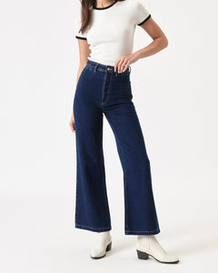 the Rolla's Women's Sailor Pant in Francoise worn by a model posing with one hip out