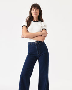 the Rolla's Women's Sailor Pant in Francoise worn by a model posing with her arms crossed