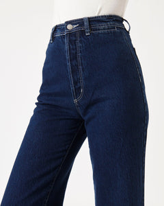 a close up of the front of the Rolla's Women's Sailor Pant in Francoise on a model