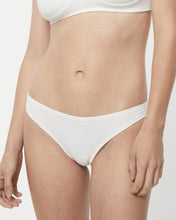 Load image into Gallery viewer, a close up of the Afends Women&#39;s Lolly Brief in White on a model
