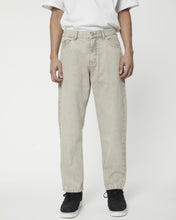 Load image into Gallery viewer, close up of the Afends Men&#39;s Ninety Two&#39;s Relaxed Jean in Faded Cement on a model
