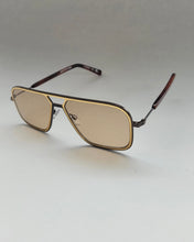 Load image into Gallery viewer, the Spitfire Congelton Sunglasses in gold and tan sitting on an angle against a neutral background
