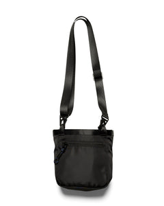 front view of the Taikan Okwa Bag in Black laying against a white background