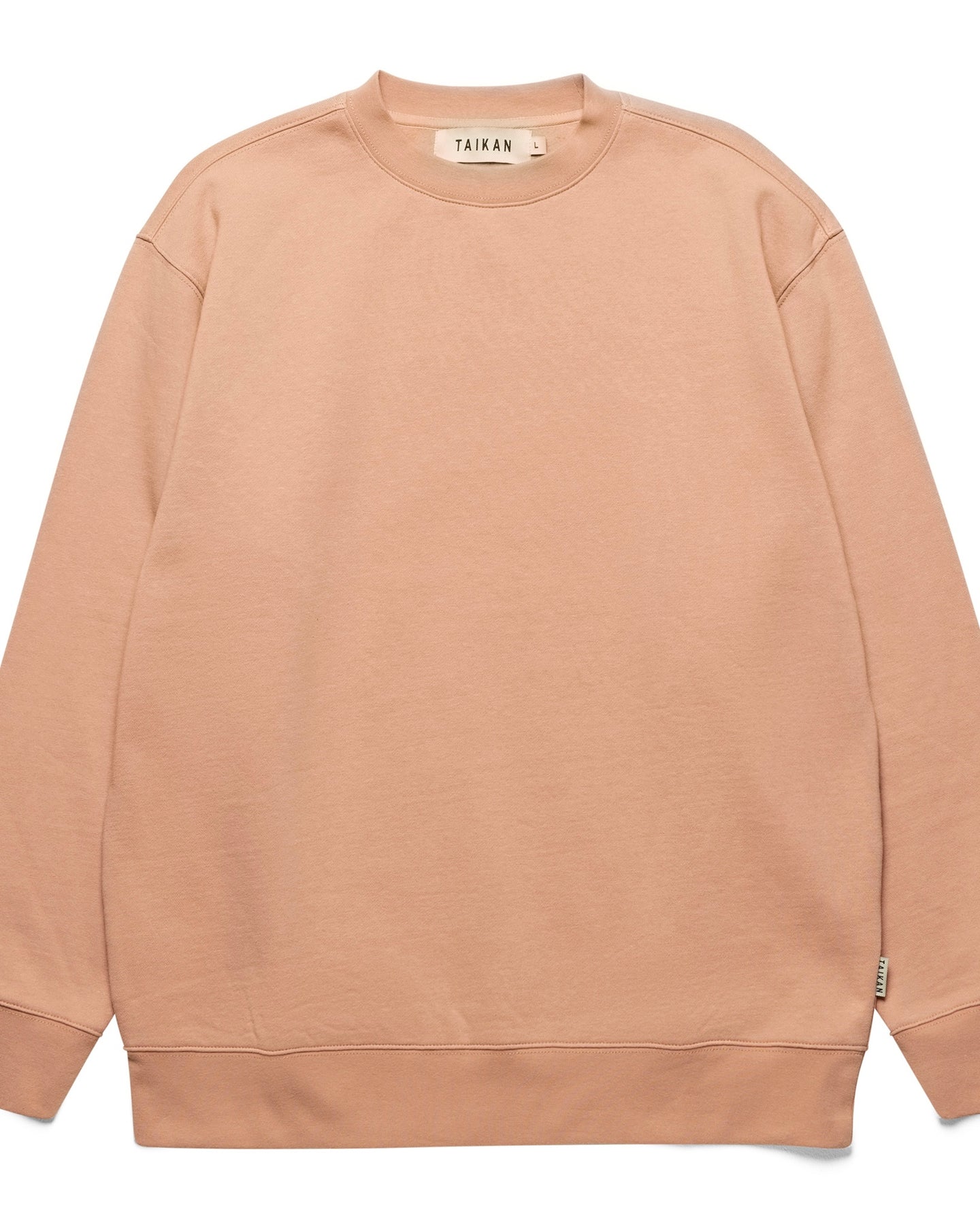 the Taikan Custom Crew Sweatshirt in Salmon laying flat on a white background
