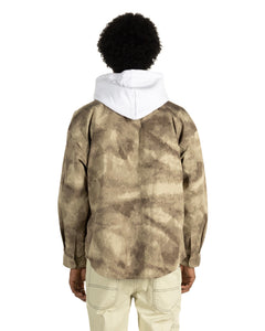 the back view of the Taikan Shirt Jacket in Abstract Camo on a model