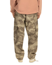 Load image into Gallery viewer, close up of the back of the Taikan Cargo Pants in Abstract Camo on a model
