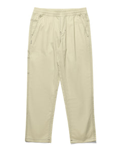 the Taikan Carpenter Pant in Cream Contrast laying flat on a white background
