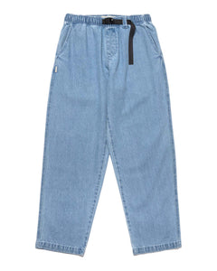 the Taikan Chiller Pant in Stonewash Blue laying flat on a white background