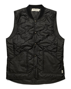 the Taikan Quilted Vest in Black laying flat on a white background