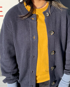 close up of the Minimum Women's Affie Cardigan in Navy Blazer worn open over a yellow tee