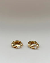 Load image into Gallery viewer, Sunday Project Marquis Earring in Gold laying on a neutral background
