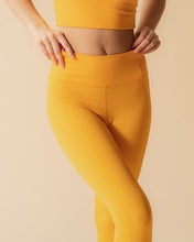 Load image into Gallery viewer, Girlfriend Collective High-Rise Crop Legging in Golden Glow
