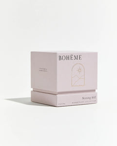 Boheme Fragrances Notting Hill Candle box on an angle against a white backgroud
