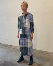 Load image into Gallery viewer, model standing angled slightly away from the camera wearing the Minimum Women&#39;s Mola Midi Skirt in Impression paired with matching shirt
