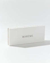 Load image into Gallery viewer, Boheme Fragrances Wanderlust Discovery Candle Set box shown on its side on an angle
