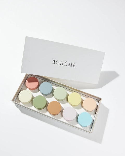 Boheme Fragrances Wanderlust Discovery Candle Set in it's box with the lid off to the side