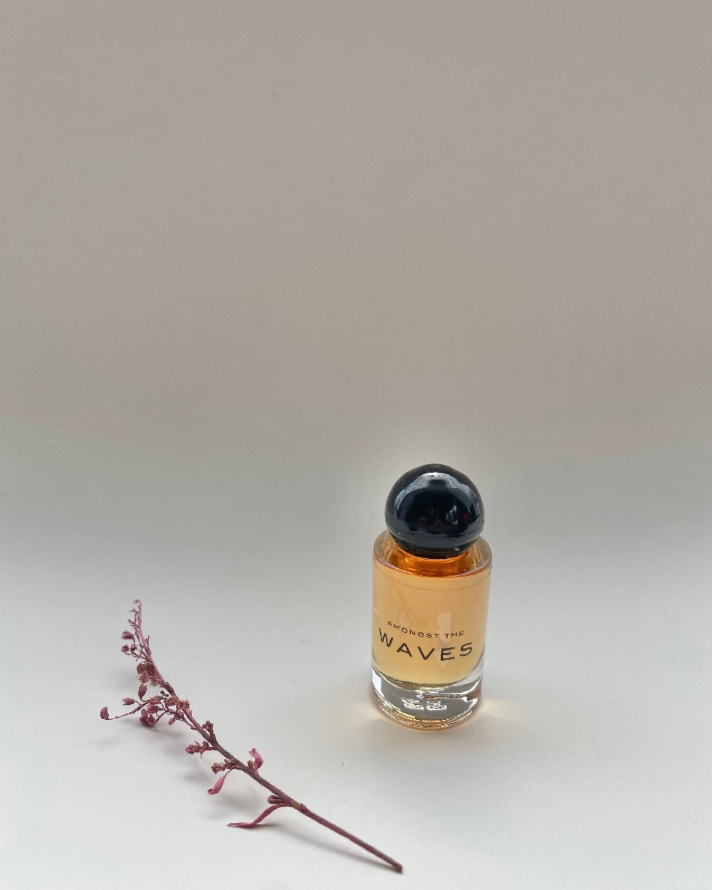 Olivine Atelier Amongst The Waves Perfume Oil in glass bottle against neutral background